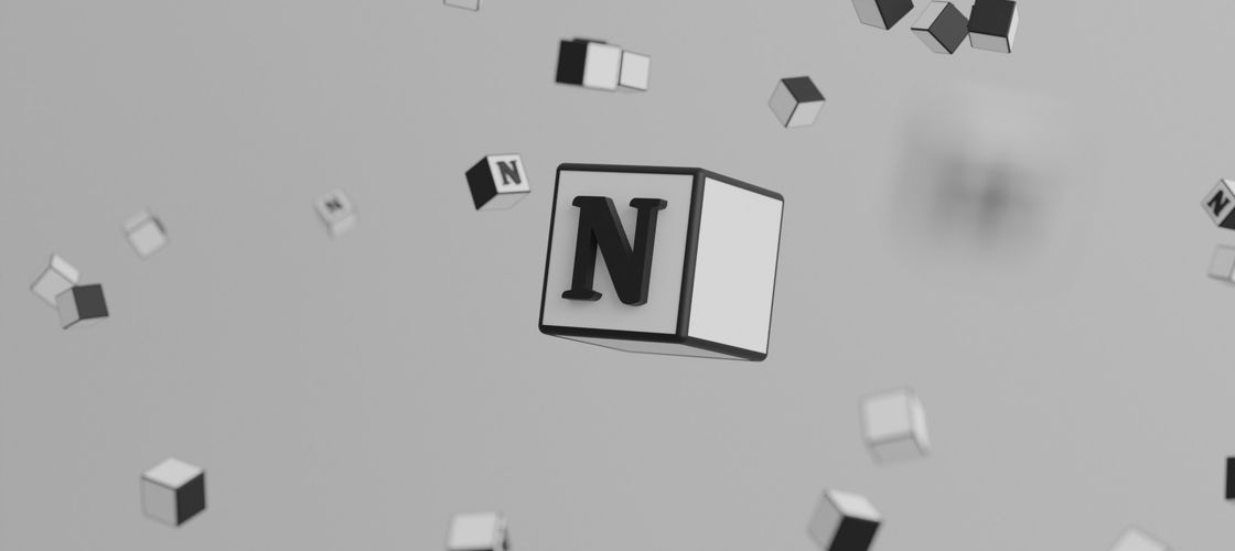 Scattered white cubes, one in focus